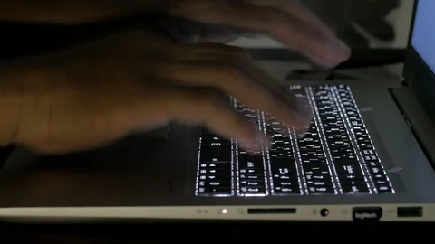 Close up  typing keyboard laptop computer black screen on the table in the da Stock Footage 89381087