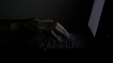 Close up  typing keyboard laptop computer black screen on the table in the da Stock Footage 89381854