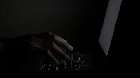 Close up  typing keyboard laptop computer black screen on the table in the da Stock Footage 89382015
