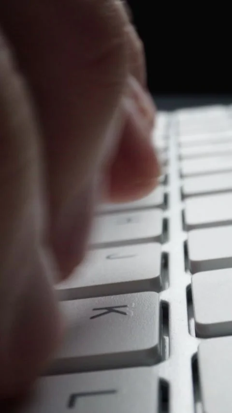 Close-up typing on keyboard with man fingers. Macro soft focus dolly shot. Stock Footage 289118769