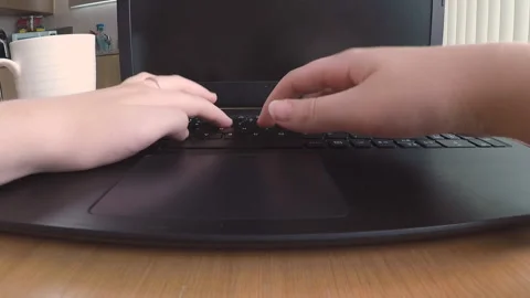Close on Typing on Laptop at Desk Stock Footage 138240708