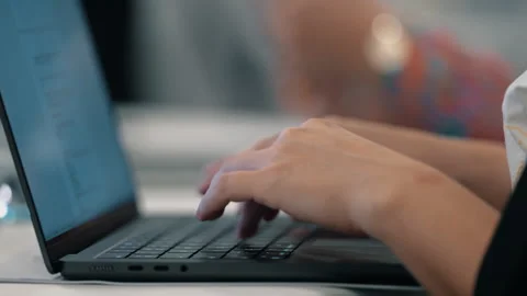 Close-up typing on laptop during office work 스톡 동영상 332212149