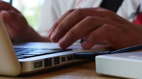 Close-up of  typing on a laptop keyboard Stock Footage 64099569