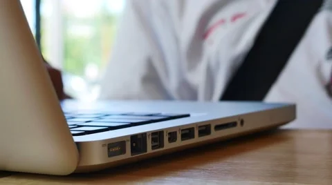 Close-up of  typing on a laptop keyboard Stock Footage 64100396