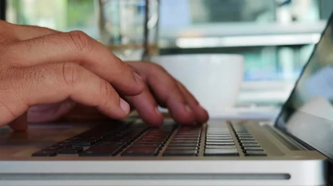 Close-up of  typing on a laptop keyboard Stock Footage 64101329