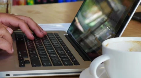 Close-up of  typing on a laptop keyboard Stock Footage 64101749