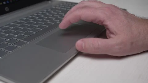 Close-up of typing on a laptop using a touchpad Stock Footage 324714091
