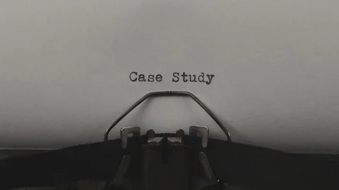 Close-up typing a text case study, old vintage typewriter with a sheet of paper Stock Footage 122530448