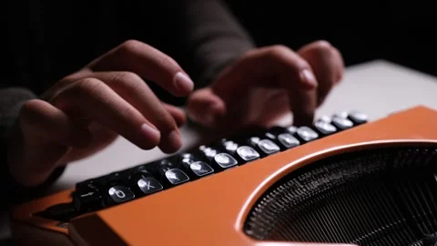Close-Up of Typing on a Typewriter Stock Footage 318590718