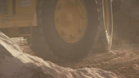 Close-up of tyres of a construction vehicle moving Stock Footage 312400443