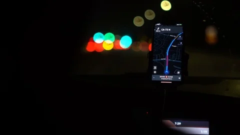 Close-up of Uber smartphone ride-sharing app with GPS navigation Stockbeeldmateriaal 107943946