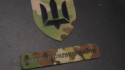 Close-Up of Ukrainian Armed Forces Patch, Detailed Stitching and Camouflage Stock Footage 302369175