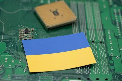 Close up of Ukrainian flag with computer hardware Stock Photos