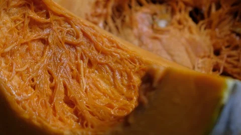 Close up of unappetizing pumpkin slice, pumpkin guts Video stock 117752016