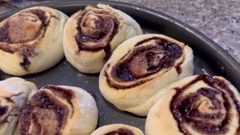 Close-Up of Unbaked Cinnamon Rolls in a Baking Pan Stock Footage 345522439