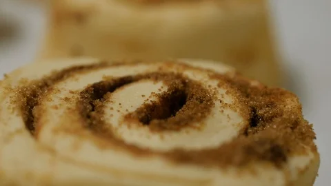 Close up of uncooked cinnamon roll as camera slowly turns Stock-Footage 93371623