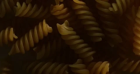 Close-Up of Uncooked Fusilli Pasta Stock Footage 295142307