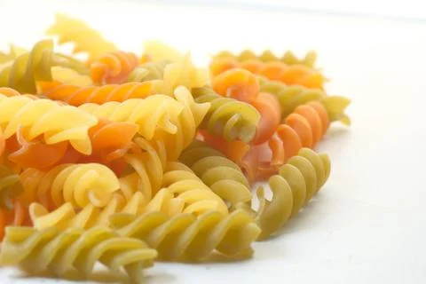 Close up of uncooked macaroni isolated on white Stock Photos