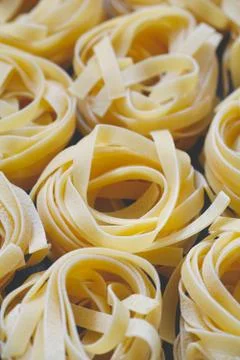 Close-up of uncooked nests of spaghetti Stock Photos
