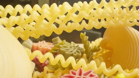 Close-up of uncooked pasta of different shapes Stock Footage 239930314