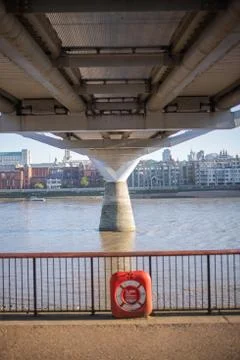 Close up from Underneath Millenium Bridge with the River Thames Below Stock Photos