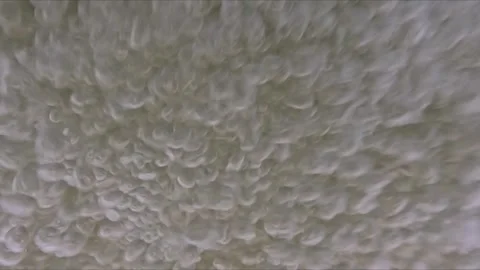 Close underwater scene of air bubbles in foamy water captured in slow motio.. Stock Footage 332442918