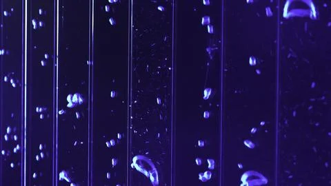 Close up of underwater view of air bubbles in colored liquid substance. Clip Stock Illustration