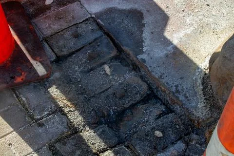 Close-Up of Uneven Brick Pavement at Construction Site Stock Photos