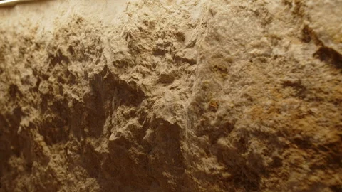 Close Up of Uneven Earthen Wall Surface Stock Footage 301531514