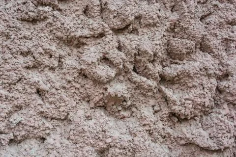 Close up uneven plaster surface texture background 写真素材
