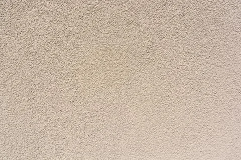 Close up uneven plaster surface texture background 写真素材