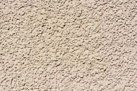 Close up uneven plaster surface texture background Stock Photos