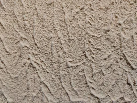 Close up uneven plaster surface texture background. horizontal rough abstract 스톡 사진