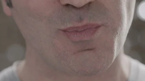 Close-up of unidentified cheerful middle-aged man eating meat Stock Footage 143090213