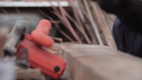 Close-up of unidentified worker in work gloves measuring the length and width of Stock Footage 132321969