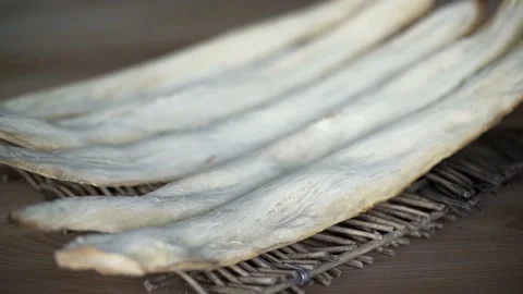 Close up of a unique semilunar flatbread, important part of Kakhetian cuisine. Stock Footage 238624859