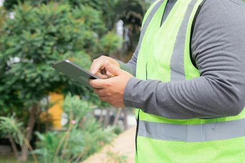 Close-up unrecognizable construction project foreman inspects construction .. Stock Photos