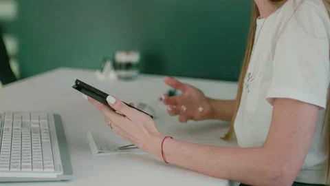 Close-up of unrecognizable female hands holding phone. Woman gestures with her Stock Footage 170282453