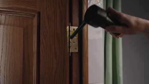 Close-up of unrecognizable handyman using blower to remove dust and debris from Stock Footage 317303022