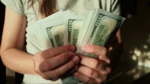 Close up. Unrecognizable lady checks amount of cash money. Housewife hands Stock Footage 150441102