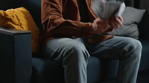 A close-up of an unrecognizable male character joyfully holding a pile of money Stock Footage 339097684
