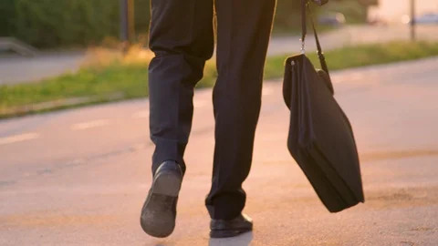 CLOSE UP: Unrecognizable man in suit experiencing a nervous breakdown after work Stock Footage 101335705