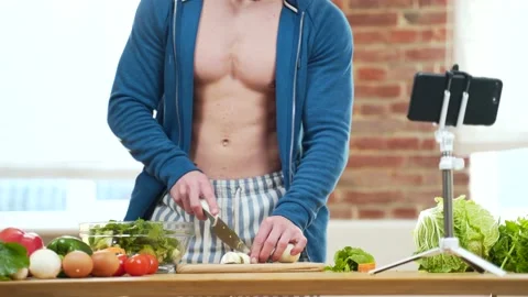 Close up unrecognizable Portrait young sexy male athlete preparing food in kitch Stock Footage 143754469