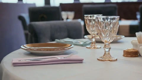 Close up of unrecognizable waiter putting plate on dining table Stock Footage 223012522