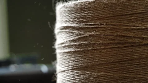 Close-Up Unrolling Jute Twine from Roll with Natural Fiber Texture Stock Footage 315528768