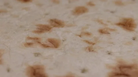 Close up untopped baked flatbread pizza round Stock Footage 144223647