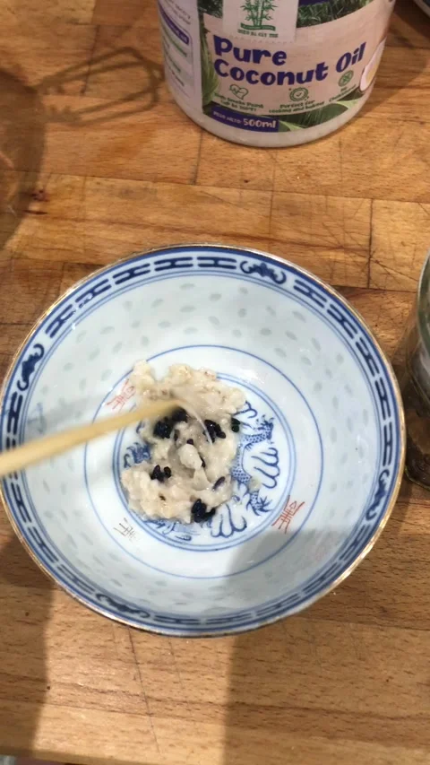 Close-Up Of Unusual Mixture Rice Oats Black Rice Stirred With Stick Stock-Footage 333063011