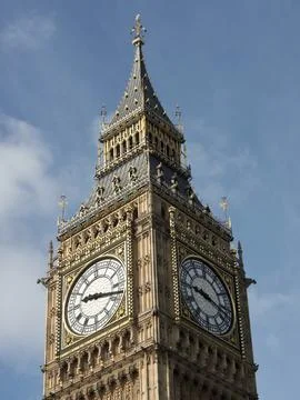Close-up of the upper part of the Big Ben tower with clearly visible clock face, Stock Photos