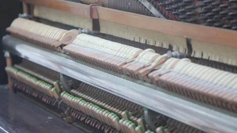 Close-Up of Upright Piano Action and Hammers Playing Vidéo 341033009