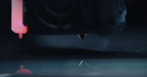 Close ups of a 3D printer moving and printing an object Stock Footage 301831341